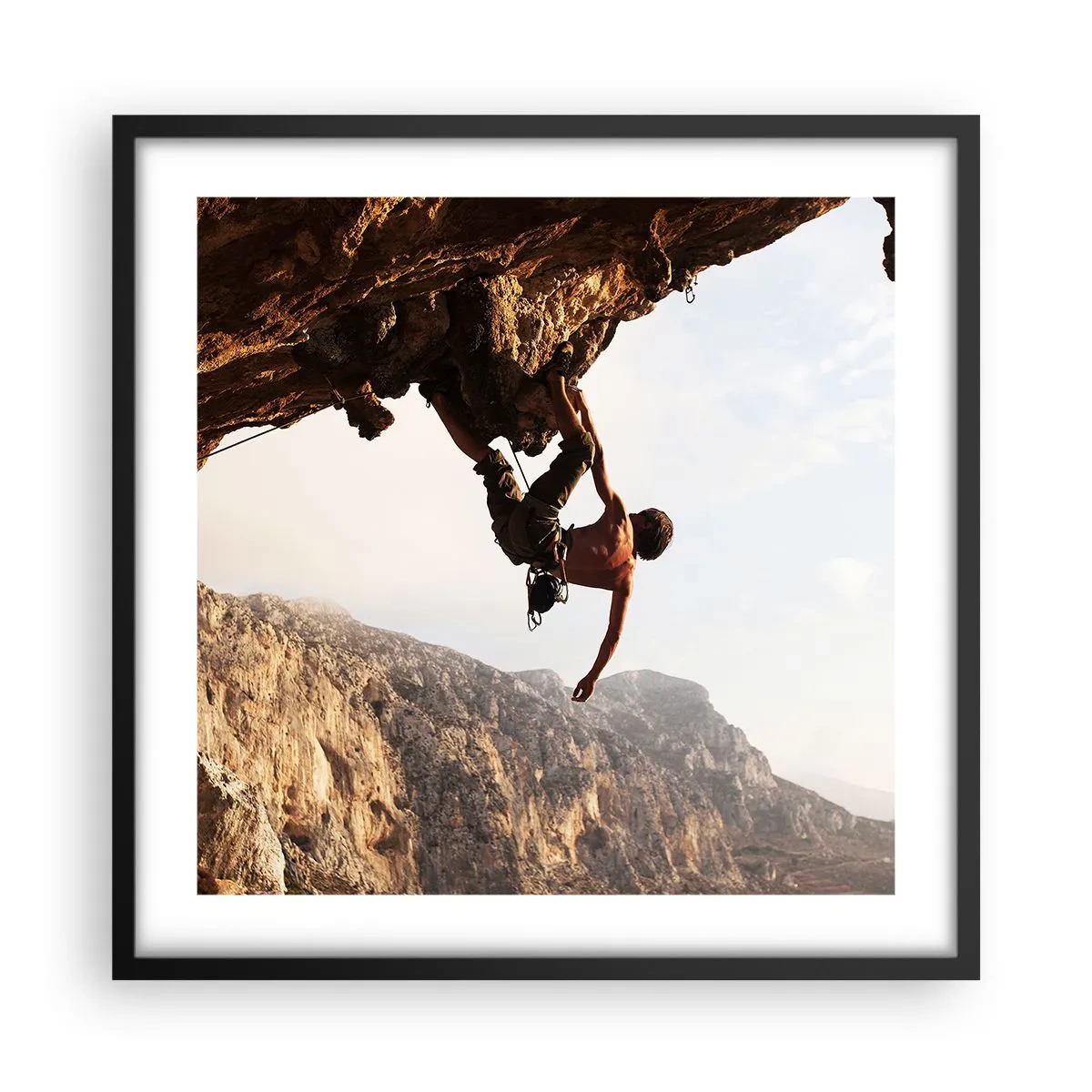 Poster în ramă neagră - Lumea s-a micșorat într-un pumn pe un afloriment de bolovani - 50x50 cm