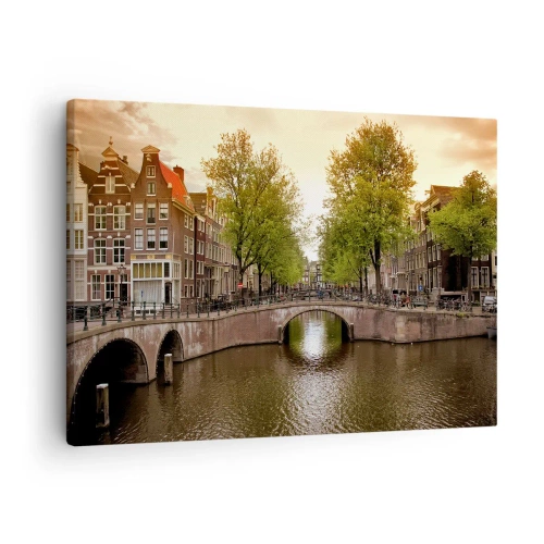 Tablou pe pânză Canvas - Un canal din Amsterdam înconjurat de case istorice de locuit - 70x50cm - Cu barca sau cu bicicleta? - Decorațiune modernă pentru perete pentru living și dormitor ARTTOR