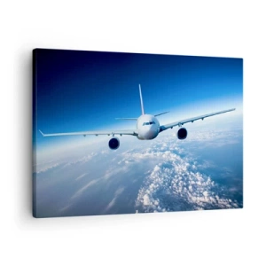 Tablou pe pânză Canvas - Un avion zburând deasupra norilor pe un cer albastru - 70x50cm - Zbor pentru că vreau - Decorațiune modernă pentru perete pentru living și dormitor ARTTOR