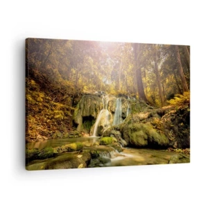 Tablou pe pânză Canvas - O cascadă în pădure, înconjurată de verdeață, în razele soarelui - 70x50cm - Cascada de pădure în verde - Decorațiune modernă pentru perete pentru living și dormitor ARTTOR