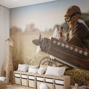 Tapet Standard Eco - Copil în costum de pilot într-un avion de lemn pe câmp - 100x70cm - Porniți spre vis - Decorațiune modernă pentru perete pentru living și dormitor ARTTOR
