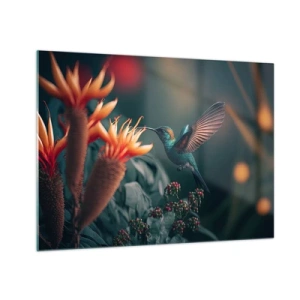 Tablou pe sticlă - O colibri plutește deasupra florilor exotice printre frunze. - 70x50cm - Viață cu adevărat colorată - Decorațiune modernă pentru perete pentru living și dormitor ARTTOR