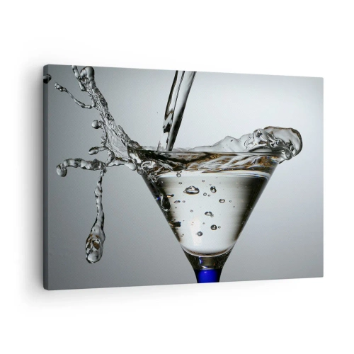 Tablou pe pânză Canvas - Pahar Martini cu stropi dinamici de apă pe un fundal deschis. - 70x50cm - La marginea paharului - Decorațiune modernă pentru perete pentru living și dormitor ARTTOR