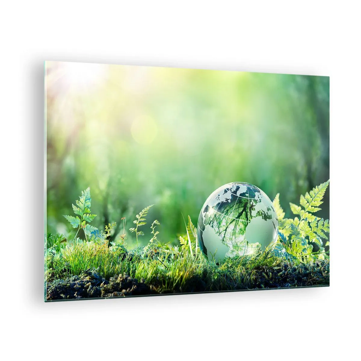 Tablou pe sticlă - O sferă de sticlă cu o hartă a lumii pe un fundal de natură verde - 70x50cm - Planeta verde - Decorațiune modernă pentru perete pentru living și dormitor ARTTOR