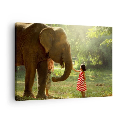 Tablou pe pânză Canvas - O fată într-o rochie roșie atingând un elefant în pădure. - 70x50cm - Puterea prieteniei - Decorațiune modernă pentru perete pentru living și dormitor ARTTOR