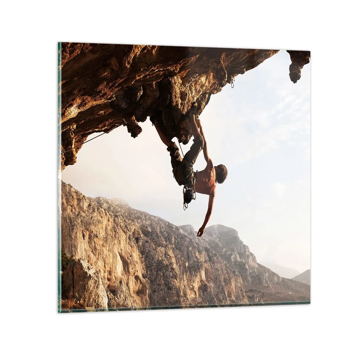 Tablou pe sticlă - Lumea s-a micșorat într-un pumn pe un afloriment de bolovani - 70x70 cm