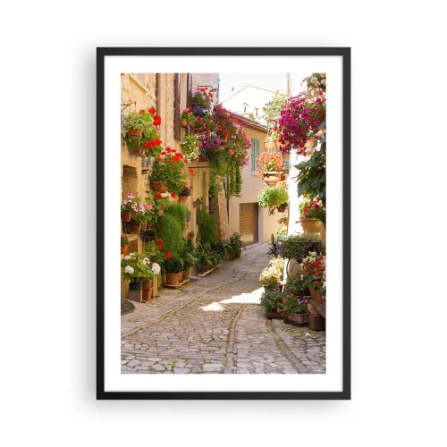 Poster în ramă neagră - O stradă înflorită, cu pavaj de piatră și ghivece de flori - 50x70cm - Într-un potop de flori - Decorațiune modernă pentru perete pentru living și dormitor ARTTOR