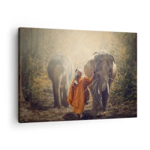 Tablou pe pânză Canvas - Un călugăr într-o robă portocalie conduce un elefant în pădure. - 70x50cm - Înțelegere deplină - Decorațiune modernă pentru perete pentru living și dormitor ARTTOR