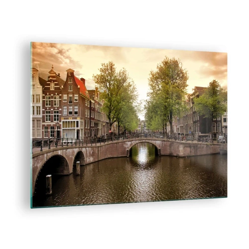 Tablou pe sticlă - Un canal și un pod înconjurate de case de locuit în Amsterdam - 70x50cm - Cu barca sau cu bicicleta? - Decorațiune modernă pentru perete pentru living și dormitor ARTTOR