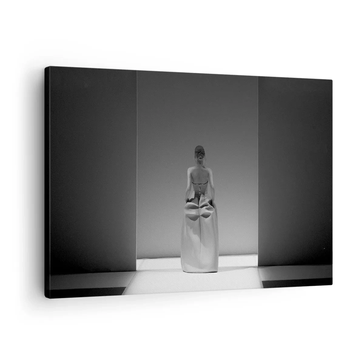Tablou pe pânză Canvas - O pictură alb-negru cu o scenă minimalistă a unei femei într-un spațiu geometric. - 70x50cm - Simplitate sofisticată - Decorațiune modernă pentru perete pentru living și dormitor ARTTOR