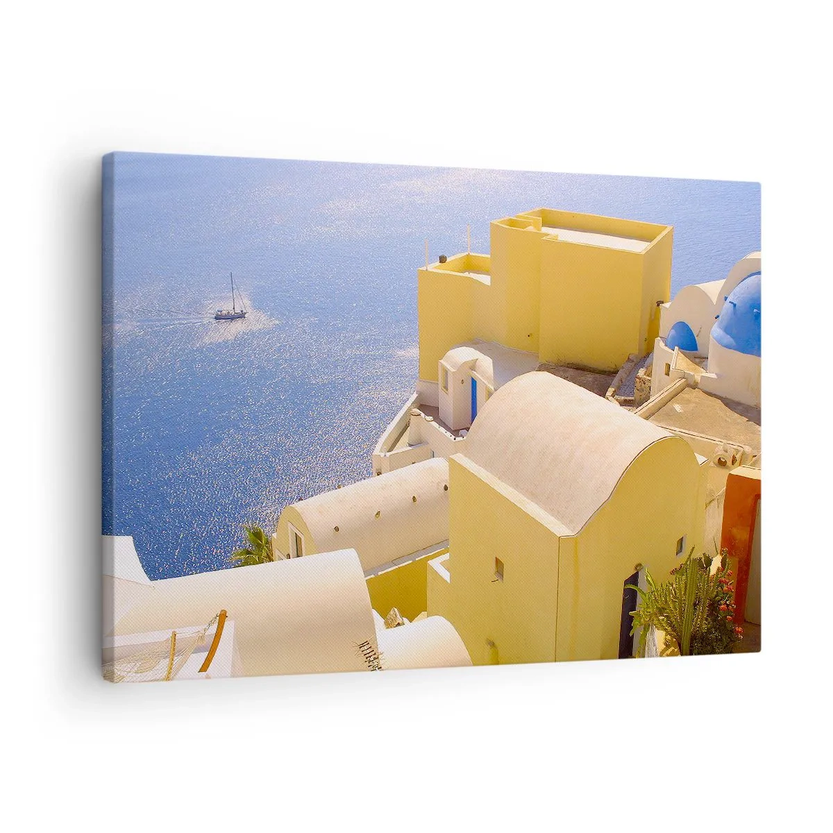 Tablou pe pânză Canvas - Arhitectură grecească cu vedere la mare și o barcă în fundal - 70x50cm - Peisaj grecesc în alb și albastru - Decorațiune modernă pentru perete pentru living și dormitor ARTTOR