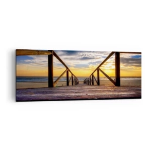 Tablou pe pânză - Direct la o plajă liniștită la apus de soare - 140x50 cm