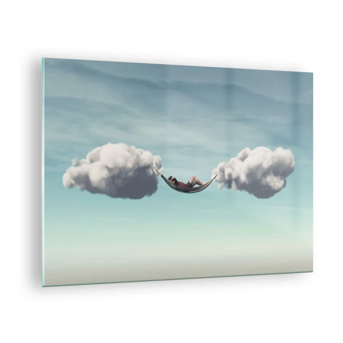 Tablou pe sticlă - Hamacuri de nori pe un cer albastru - 70x50cm - Fericirea momentului - Decorațiune modernă pentru perete pentru living și dormitor ARTTOR
