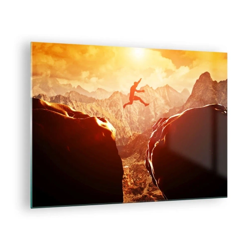 Tablou pe sticlă - Sărind peste o prăpastie într-un peisaj montan la apus - 70x50cm - Trecând frontierele - Decorațiune modernă pentru perete pentru living și dormitor ARTTOR