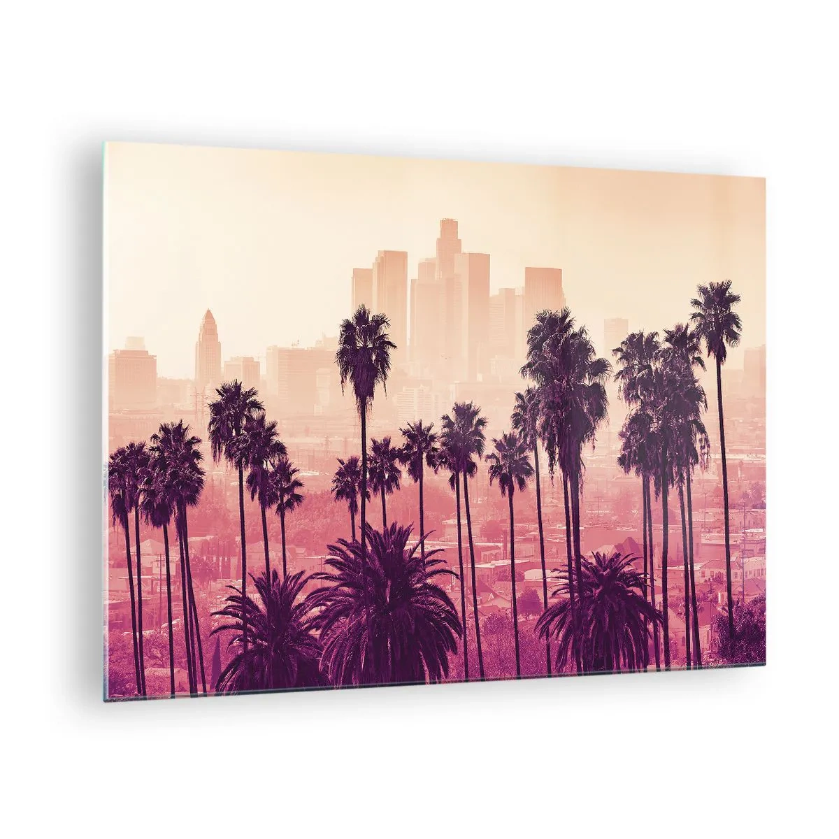 Tablou pe sticlă - Palmieri pe fundalul orizontului orașului în tonuri calde de apus - 70x50cm - Peisaj din California - Decorațiune modernă pentru perete pentru living și dormitor ARTTOR
