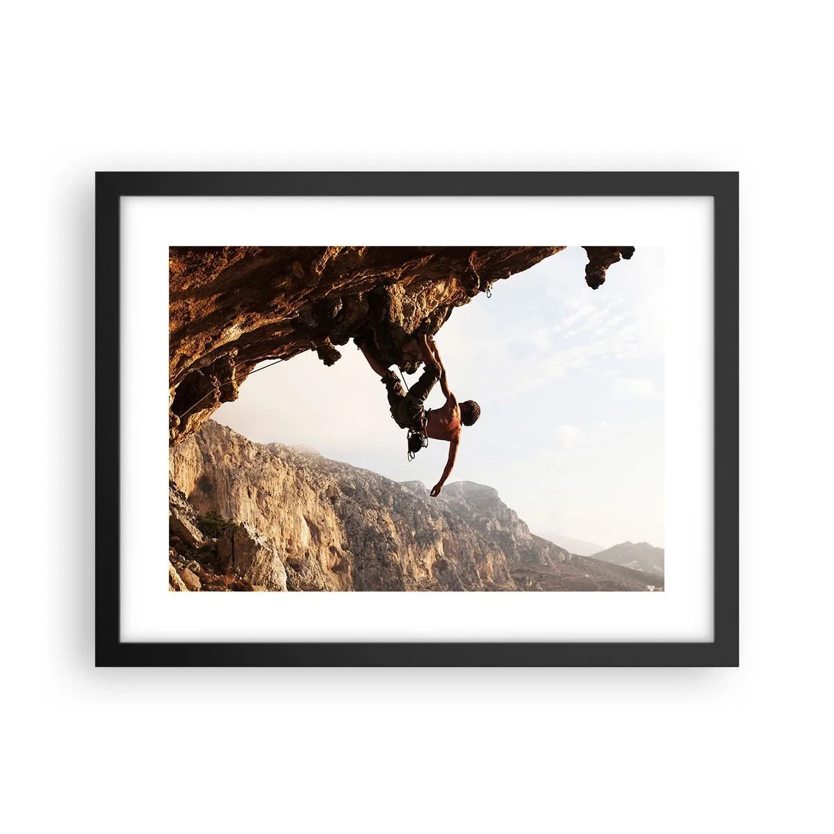 Poster în ramă neagră - Lumea s-a micșorat într-un pumn pe un afloriment de bolovani - 40x30 cm