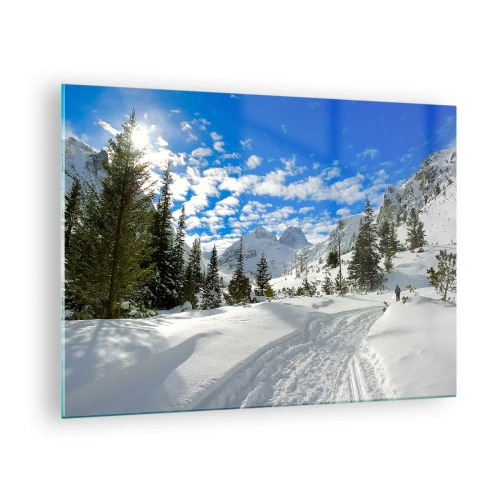 Tablou pe sticlă - Peisaj montan de iarnă cu pădure și cer albastru - 70x50cm - În zăpadă și soare - Decorațiune modernă pentru perete pentru living și dormitor ARTTOR