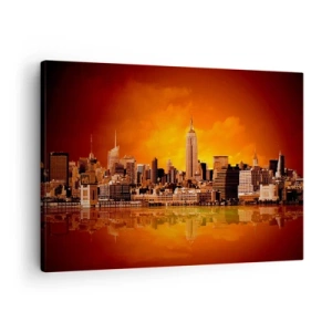 Tablou pe pânză Canvas - Panoramă a orașului la apus, cu clădiri reflectate în apă - 70x50cm - Panorama unui oraș mare în galben și maro - Decorațiune modernă pentru perete pentru living și dormitor ARTTOR