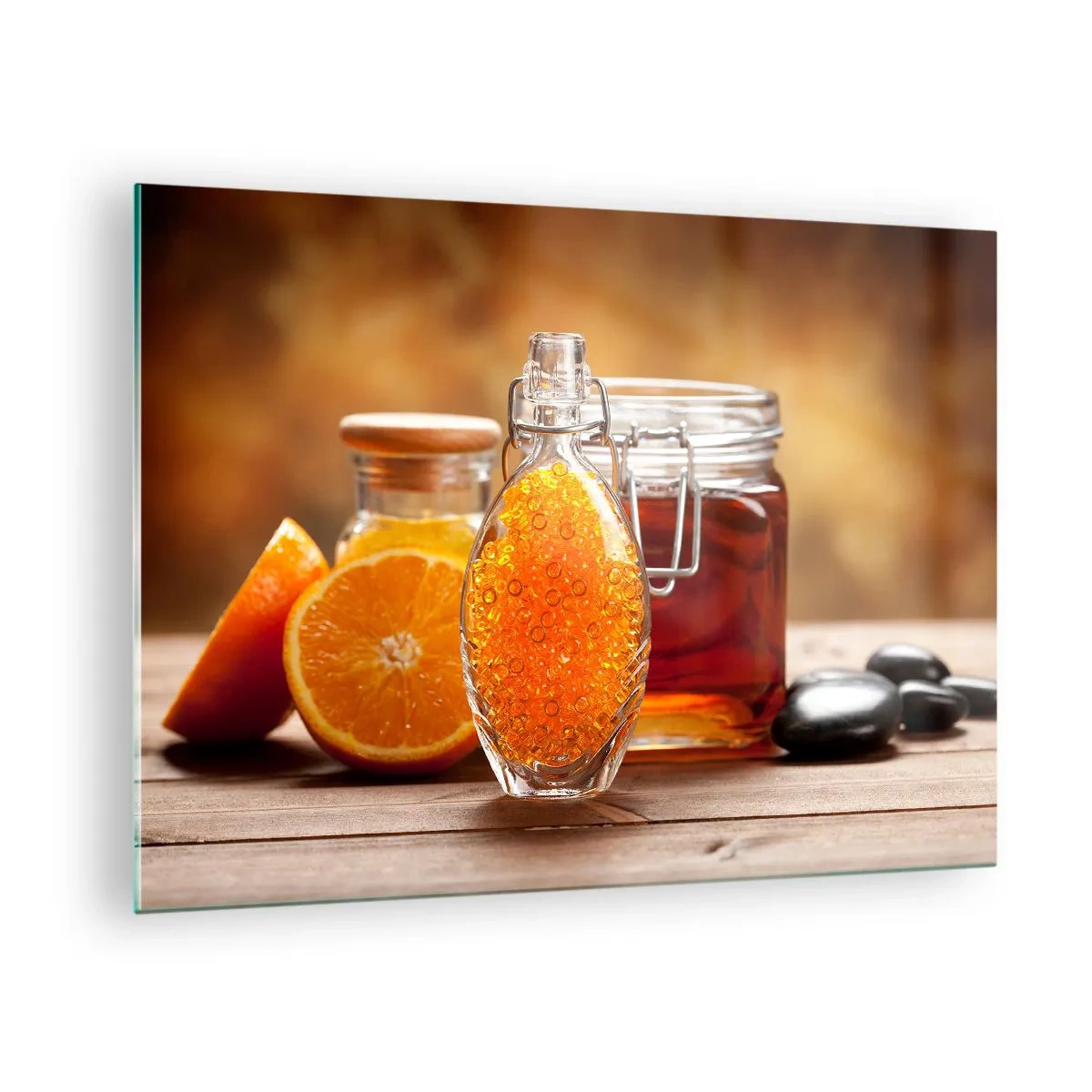 Tablou pe sticlă - O sticlă de ulei și o portocală pe o masă de lemn - 70x50cm - Gust și aromă de soare - Decorațiune modernă pentru perete pentru living și dormitor ARTTOR