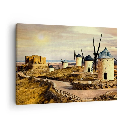 Tablou pe pânză Canvas - Mori de vânt pe dealuri cu un castel istoric în fundal - 70x50cm - Don Quijote apare imediat - Decorațiune modernă pentru perete pentru living și dormitor ARTTOR