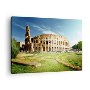 Tablou pe pânză Canvas - Colosseumul din Roma, înconjurat de verdeață și cer albastru - 70x50cm - Încă mai poți auzi zgomotul armelor - Decorațiune modernă pentru perete pentru living și dormitor ARTTOR