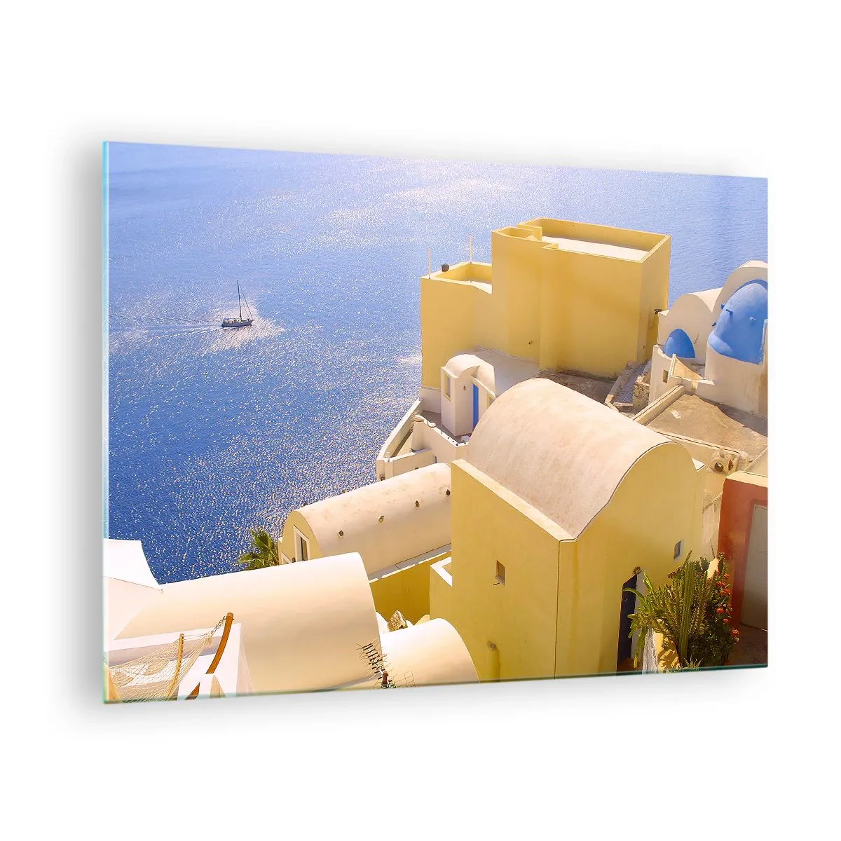 Tablou pe sticlă - Vedere a orașului Santorini cu marea albastră și clădirile albe - 70x50cm - Peisaj grecesc în alb și albastru - Decorațiune modernă pentru perete pentru living și dormitor ARTTOR