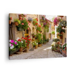 Tablou pe pânză Canvas - O stradă cu flori în ghivece și ziduri de piatră - 70x50cm - Într-un potop de flori - Decorațiune modernă pentru perete pentru living și dormitor ARTTOR