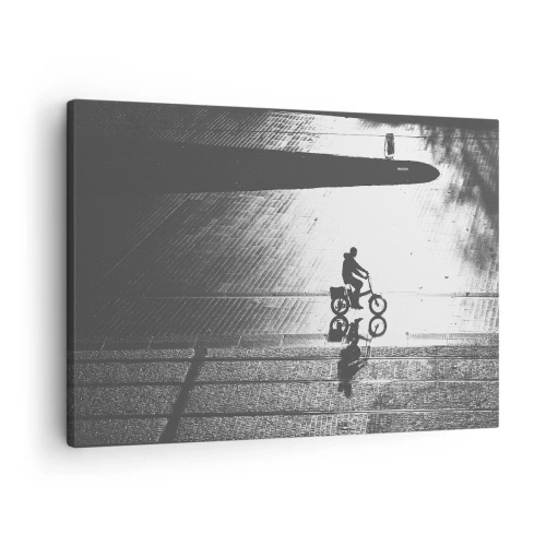 Tablou pe pânză Canvas - Siluetă alb-negru a unui ciclist pe o stradă udă - 70x50cm - Înainte, prin oraș - Decorațiune modernă pentru perete pentru living și dormitor ARTTOR