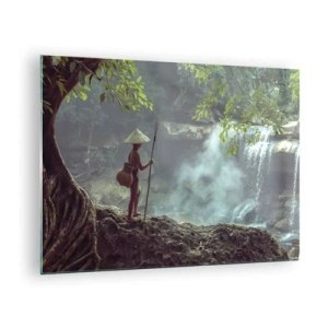 Tablou pe sticlă - Un băiat cu o suliță la o cascadă din pădurea tropicală - 70x50cm - Prietenul naturii - Decorațiune modernă pentru perete pentru living și dormitor ARTTOR