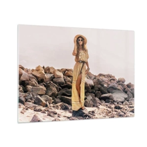 Tablou pe sticlă - O femeie într-o rochie în stil boho pe un țărm stâncos - 70x50cm - Magia pietrelor - Decorațiune modernă pentru perete pentru living și dormitor ARTTOR