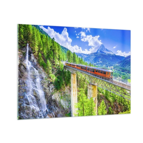 Tablou pe sticlă - Tren alpin pe un pod cu vedere la o cascadă - 70x50cm - Calea ferată din Alpi - Decorațiune modernă pentru perete pentru living și dormitor ARTTOR
