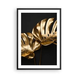 Poster în ramă neagră - Frunze de monstera aurii pe fundal negru, un contrast elegant de culori - 50x70cm - Comorile naturii - Decorațiune modernă pentru perete pentru living și dormitor ARTTOR