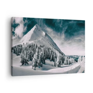 Tablou pe pânză Canvas - Un vârf de munte acoperit de zăpadă, înconjurat de o pădure de iarnă - 70x50cm - Țara zăpezii și a gheții - Decorațiune modernă pentru perete pentru living și dormitor ARTTOR