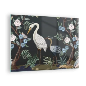 Tablou pe sticlă - Păsări colorate printre ramuri înflorite pe un fundal întunecat - 70x50cm - Parada păsărilor - Decorațiune modernă pentru perete pentru living și dormitor ARTTOR