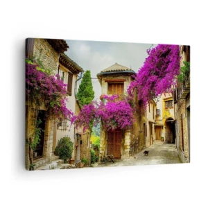 Tablou pe pânză Canvas - O stradă de piatră cu flori roz și case - 70x50cm - Sub un baldachin floral - Decorațiune modernă pentru perete pentru living și dormitor ARTTOR