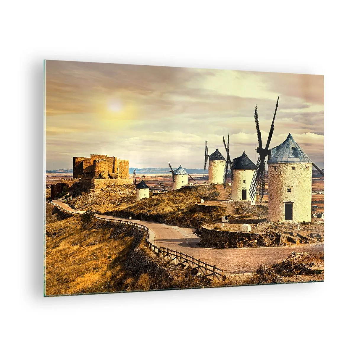 Tablou pe sticlă - Mori de vânt și un castel în peisaj la apus - 70x50cm - Don Quijote apare imediat - Decorațiune modernă pentru perete pentru living și dormitor ARTTOR