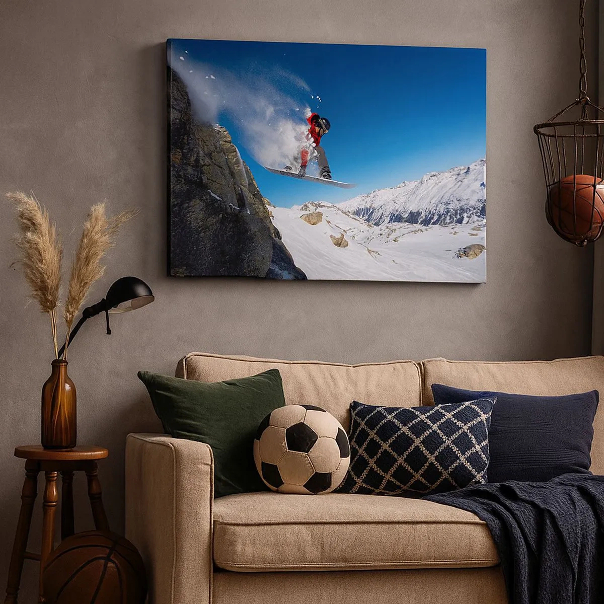 Tablou pe pânză Canvas - Un snowboarder sare de pe o stâncă pe un peisaj montan - 70x50cm - Și ai devenit parte din spațiul - Decorațiune modernă pentru perete pentru living și dormitor ARTTOR