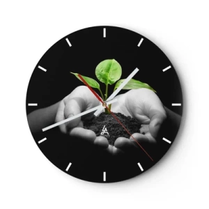 Ceas de perete - Ceas pe sticlă - O vlăstă verde ținută în mâini pe un fundal negru - 30x30cm - Iubesc natura, o protejez - Decorațiune modernă pentru perete pentru living, bucătărie și dormitor ARTTOR