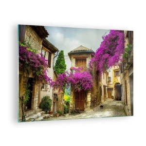 Tablou pe sticlă - O stradă fermecătoare cu viță de vie roz înflorită și case de tip bloc - 70x50cm - Sub un baldachin floral - Decorațiune modernă pentru perete pentru living și dormitor ARTTOR