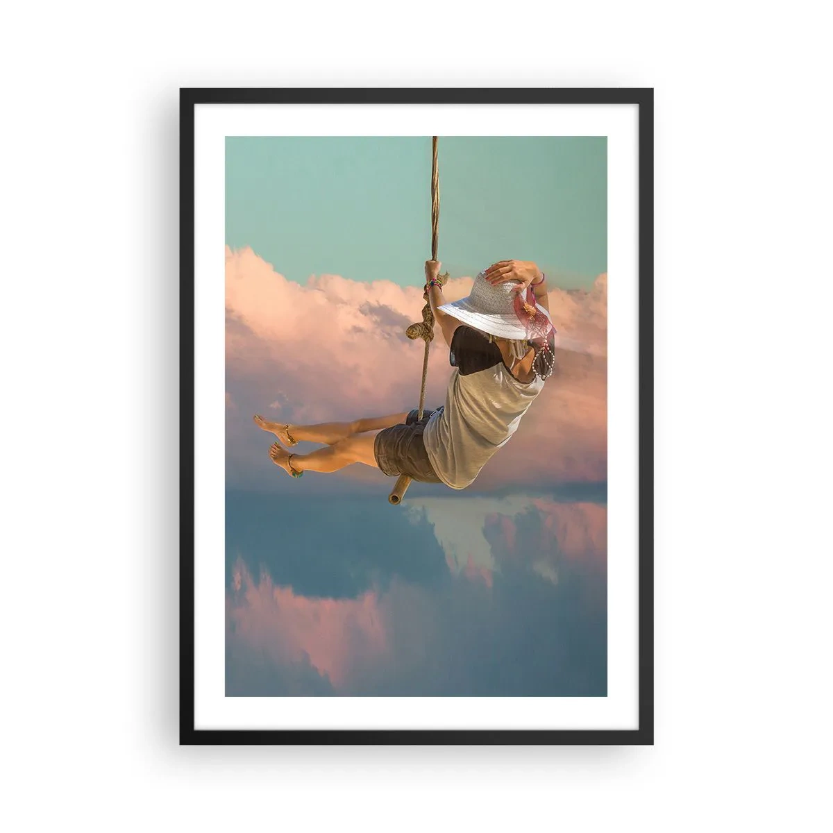 Poster în ramă neagră - O femeie pe un leagăn printre nori pastelați - 50x70cm - Distracție în nori - Decorațiune modernă pentru perete pentru living și dormitor ARTTOR