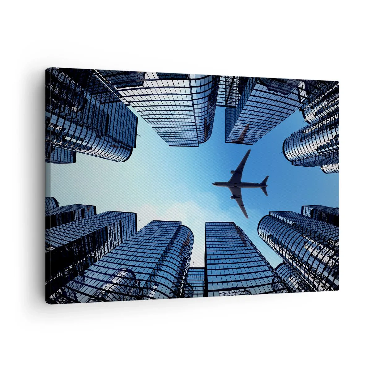 Tablou pe pânză Canvas - Un avion zburând peste zgârie-nori moderni din centrul orașului. - 70x50cm - Vedere de pe ravenă de sticlă - Decorațiune modernă pentru perete pentru living și dormitor ARTTOR