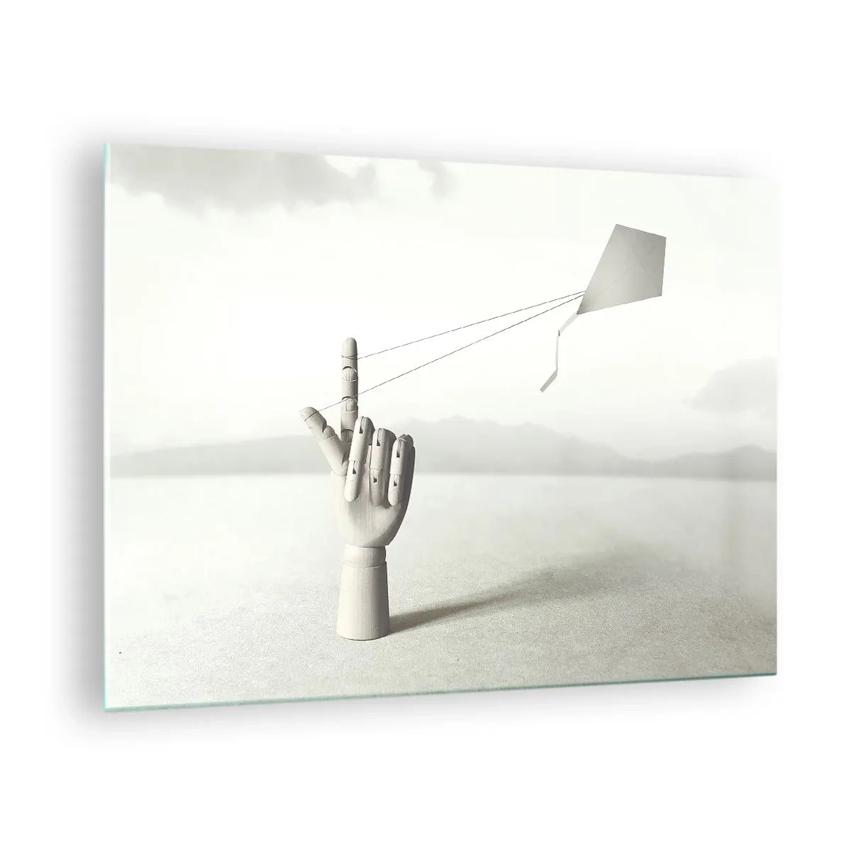Tablou pe sticlă - O mână de lemn care ține pe deget un zmeu plutitor - 70x50cm - Încercare de forță - Decorațiune modernă pentru perete pentru living și dormitor ARTTOR