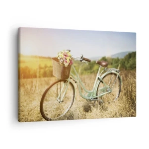 Tablou pe pânză Canvas - O bicicletă retro cu un coș plin de flori pe fundalul unei pajiști. - 70x50cm - Mă odihnesc aici un pic - Decorațiune modernă pentru perete pentru living și dormitor ARTTOR