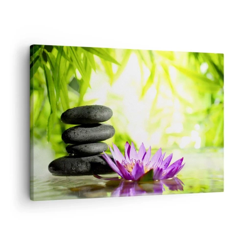 Tablou pe pânză Canvas - O grămadă de pietre zen și o floare de lotus pe un fundal de frunze de bambus. - 70x50cm - Într-o colibă de bambus - Decorațiune modernă pentru perete pentru living și dormitor ARTTOR